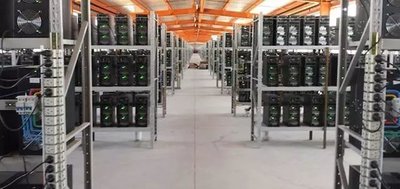 A close-up of the intricate components of a modern mining rig, showcasing its processing power and cooling system.